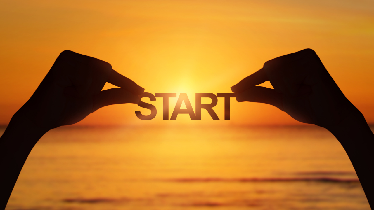 夕日とstartの文字を持ってる人